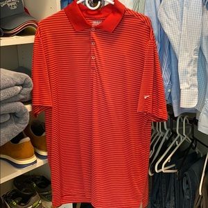 Red striped Nike performance golf polo